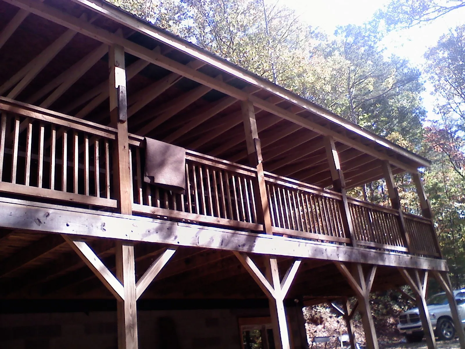 Timber framing under a new elevated porch and deck — Roof Leak Repair in Carrboro by Roofing Brothers